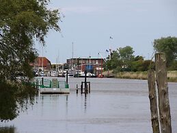 Apartment With a High Chair and bed