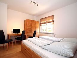 Apartment With a High Chair and bed