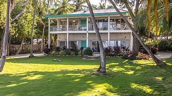 Lush Tropical Plantings In A Gated Compound Located Directly On The Fl