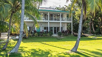 Lush Tropical Plantings In A Gated Compound Located Directly On The Fl