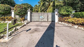 Lush Tropical Plantings In A Gated Compound Located Directly On The Fl