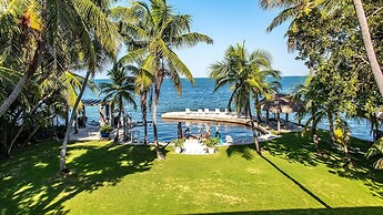 Lush Tropical Plantings In A Gated Compound Located Directly On The Fl