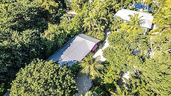 Lush Tropical Plantings In A Gated Compound Located Directly On The Fl
