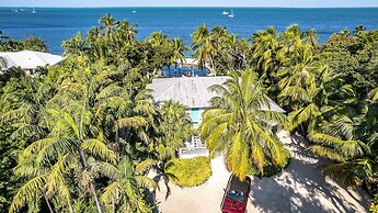 Lush Tropical Plantings In A Gated Compound Located Directly On The Fl