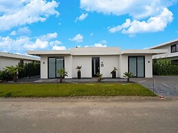 Villa With Covered Terrace and Jetty on the Water