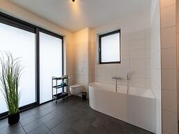 Villa With Covered Terrace and Jetty on the Water