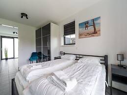 Villa With Covered Terrace and Jetty on the Water