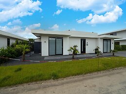 Villa With Covered Terrace and Jetty on the Water