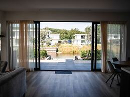 Water Villa With Garden and Jetty Near Harderwijk