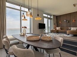 Lush Apartment With Water Views