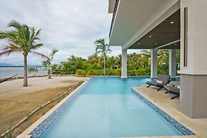 NEW 3 Story 4-bed Waterfront Villa w Sunset Views