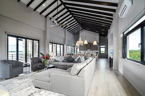 NEW 3 Story 4-bed Waterfront Villa w Sunset Views