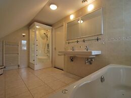 Thatched Villa With Bath in a Holiday Park