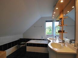 Thatched Villa With Bath in a Holiday Park