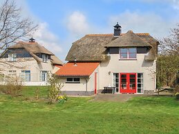 Thatched Villa With Bath in a Holiday Park