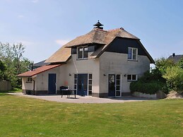 Thatched Villa With Bath in a Holiday Park