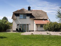 Thatched Villa With Bath in a Holiday Park