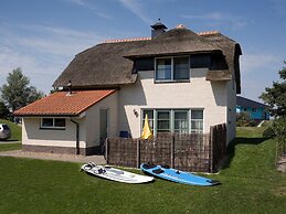 Thatched Villa With Bath in a Holiday Park