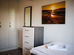 Sunny and Family Friendly Apartment Directly at the Pool