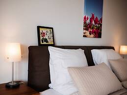 Sunny and Family Friendly Apartment Directly at the Pool