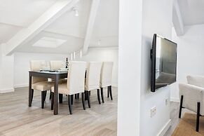 Solaga - Merced Suites