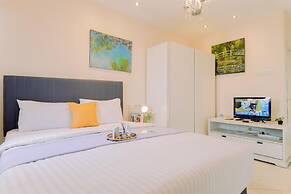 Homey And Big Studio Apartment At The Wave Kuningan