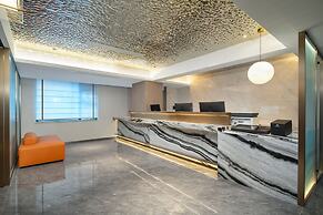 Yizhi Hotel Changgang metro Station