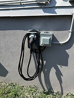 Whimsical Staycation Fire Pit Full House 2 Bedroom Home by RedAwning