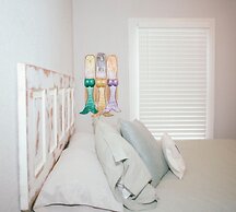 The Knotty Mermaid 2br Home In Galveston 2 Bedroom Home by RedAwning