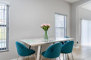 Poolside Serenity Near Disney World 4 Bedroom Home by RedAwning