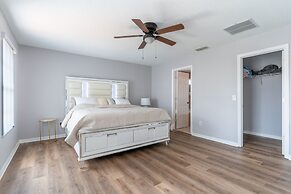 Poolside Serenity Near Disney World 4 Bedroom Home by RedAwning