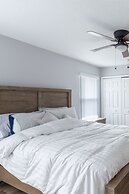 Poolside Serenity Near Disney World 4 Bedroom Home by RedAwning