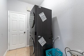 Poolside Serenity Near Disney World 4 Bedroom Home by RedAwning