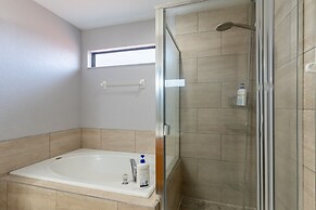 Poolside Serenity Near Disney World 4 Bedroom Home by RedAwning