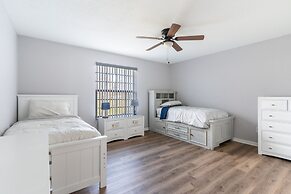 Poolside Serenity Near Disney World 4 Bedroom Home by RedAwning