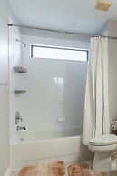 Poolside Serenity Near Disney World 4 Bedroom Home by RedAwning