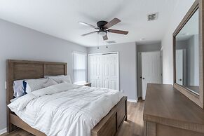 Poolside Serenity Near Disney World 4 Bedroom Home by RedAwning