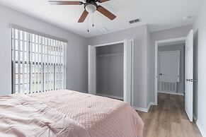 Poolside Serenity Near Disney World 4 Bedroom Home by RedAwning