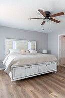 Poolside Serenity Near Disney World 4 Bedroom Home by RedAwning