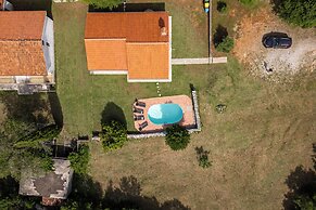 Pool House In Greenery