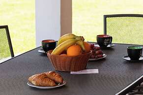 Pool House In Greenery