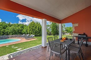 Pool House In Greenery