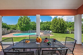 Pool House In Greenery