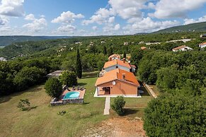 Pool House In Greenery