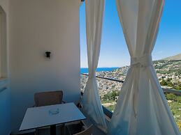 Sunset Shoreline Saranda Hotel