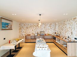 Sunset Shoreline Saranda Hotel