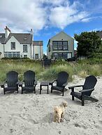 Unique House in an Idyllic Situation on a Beach