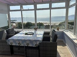 Unique House in an Idyllic Situation on a Beach