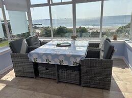 Unique House in an Idyllic Situation on a Beach