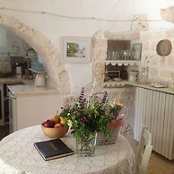 Trulli Mimosa by Pugliadamare